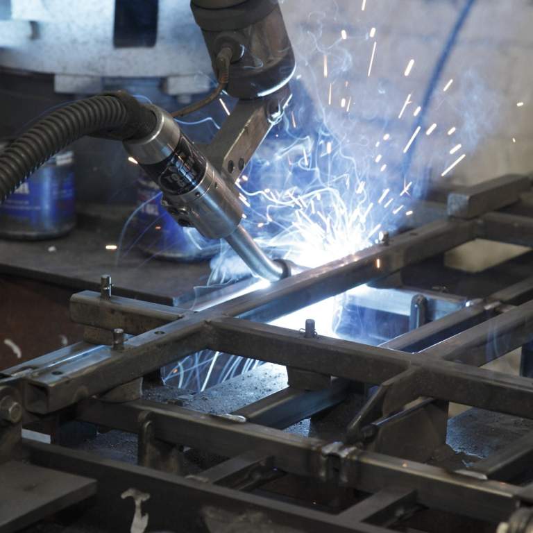 Motoman Robotic Welders with Auto Access